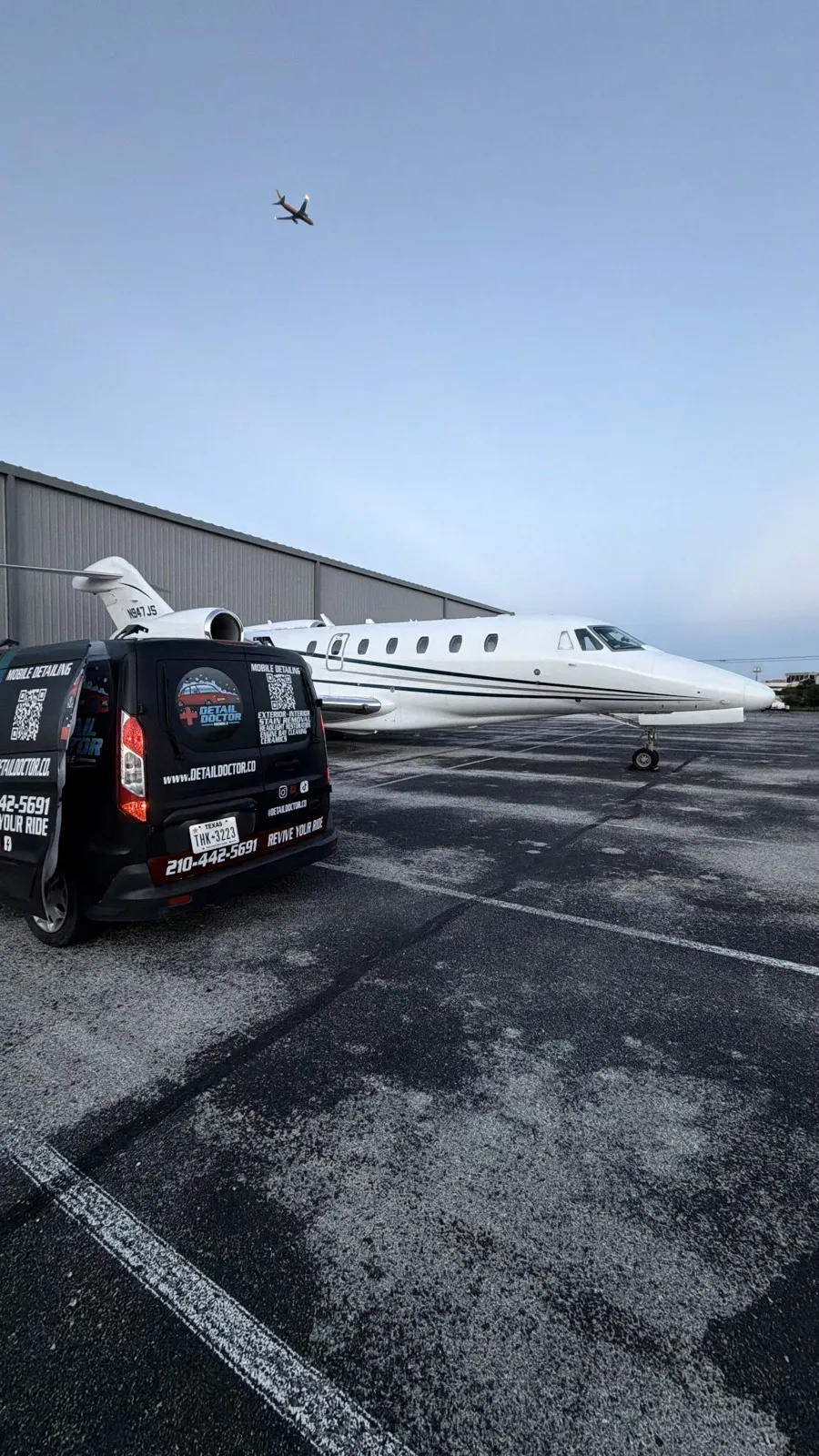Detail Doctor mobile van beside a jet on the ramp